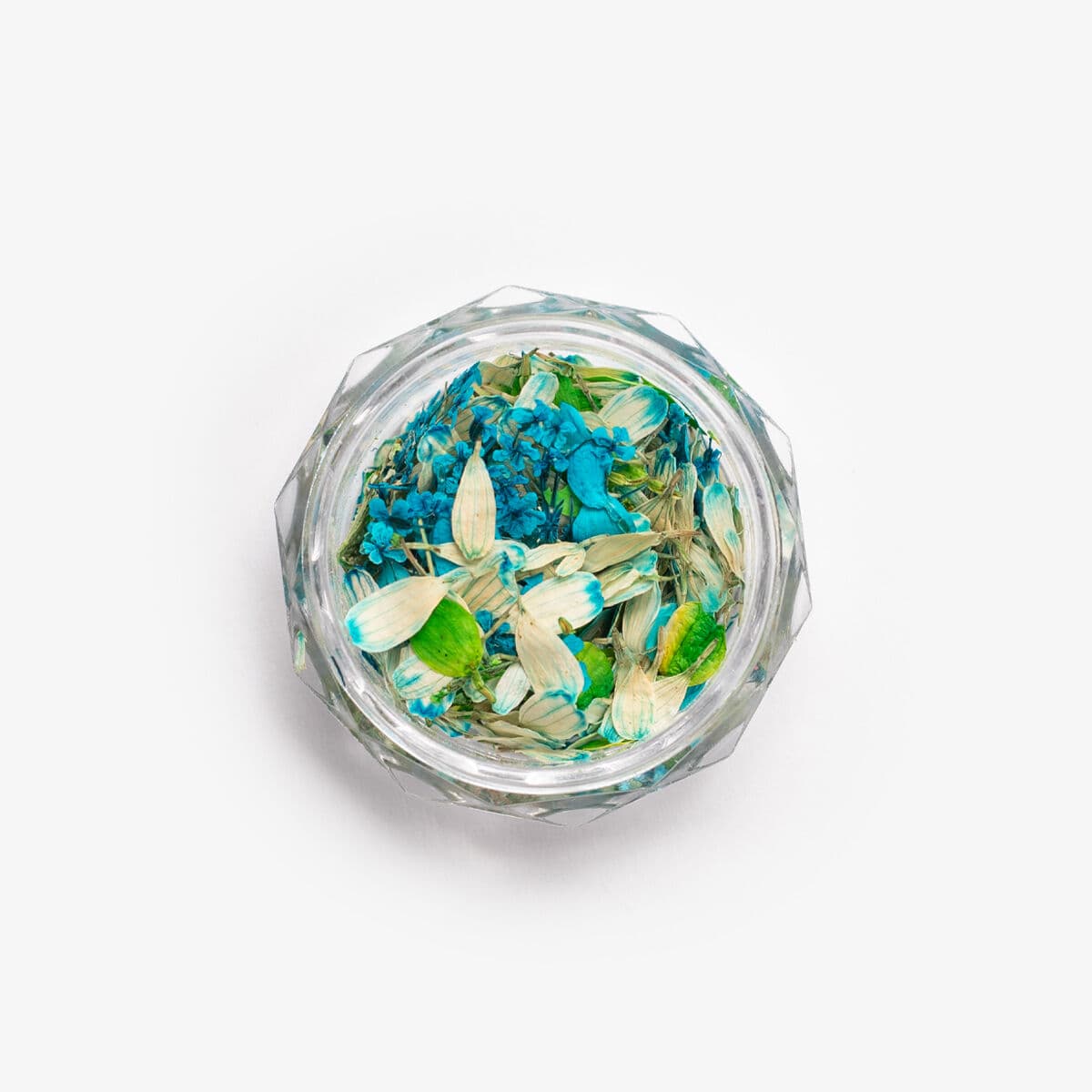 Pot des Flower Flakes Spring Meadow de Semilac, avec des pétales aux nuances de vert et turquoise pastel pour décorer les ongles en semi-permanent ou gel.