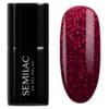 Flacon et Swatch du Vernis Semi-Permanent 955 Holly Berry Red, un rouge profond magnétique aux reflets orange chauds.