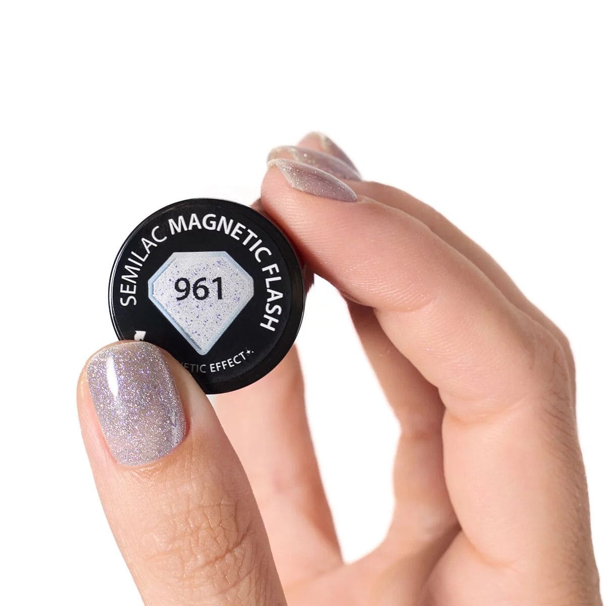 Flacon et nuancier du Vernis semi-permanent Semilac 961 Magnetic Flash, un semi-transparent argenté avec des paillettes reflectives.